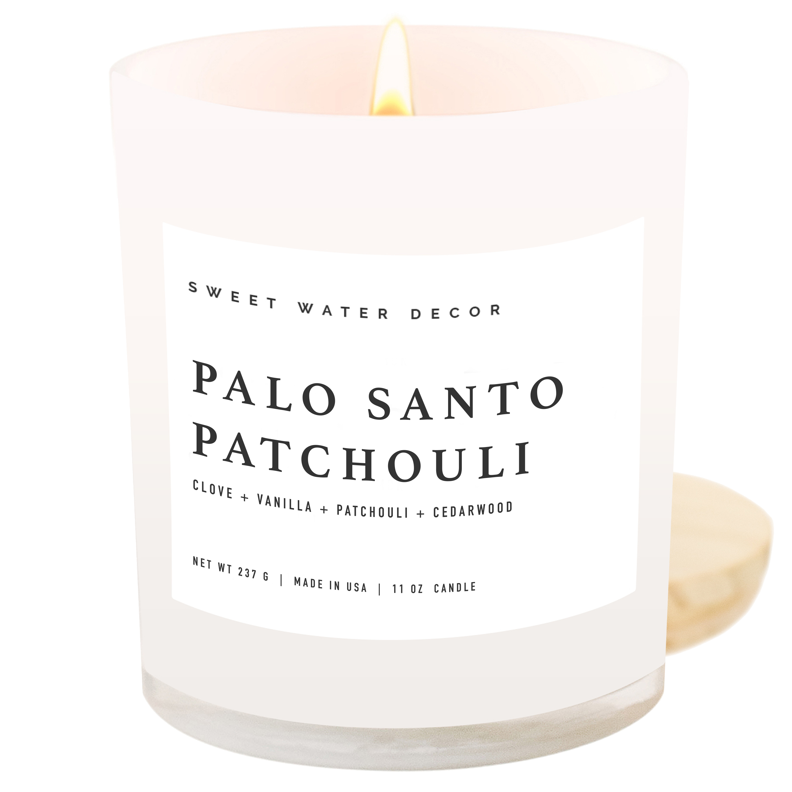 Sweet Water Decor- Palo Santo Patchouli 11 oz Soy Candle - Home Decor & Gifts