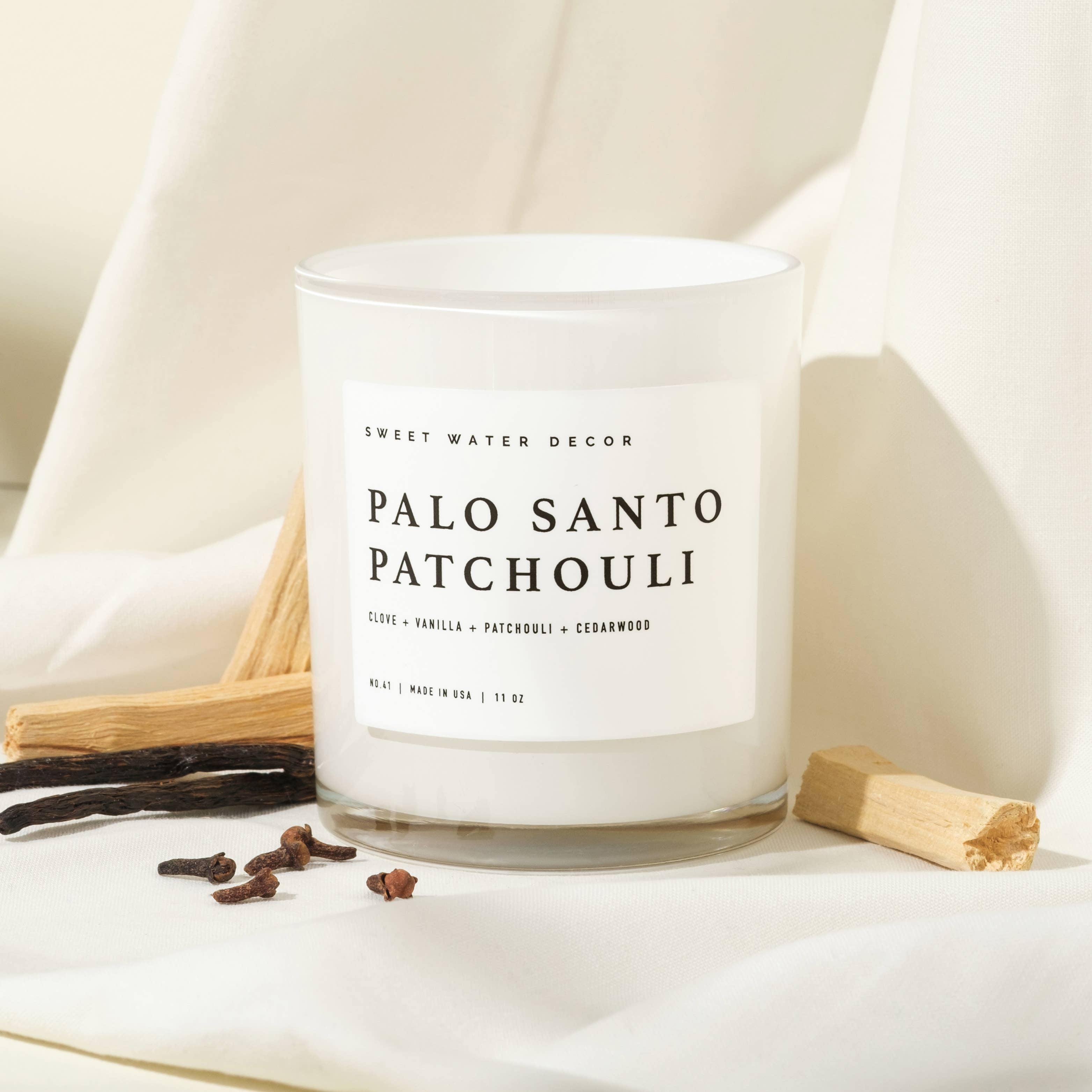 Sweet Water Decor- Palo Santo Patchouli 11 oz Soy Candle - Home Decor & Gifts